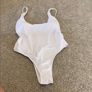Sexy white one piece, never worn